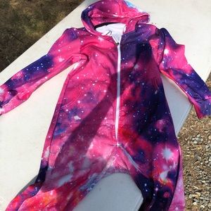 Sucha. Fun onesie with a hood , glows in the black light too